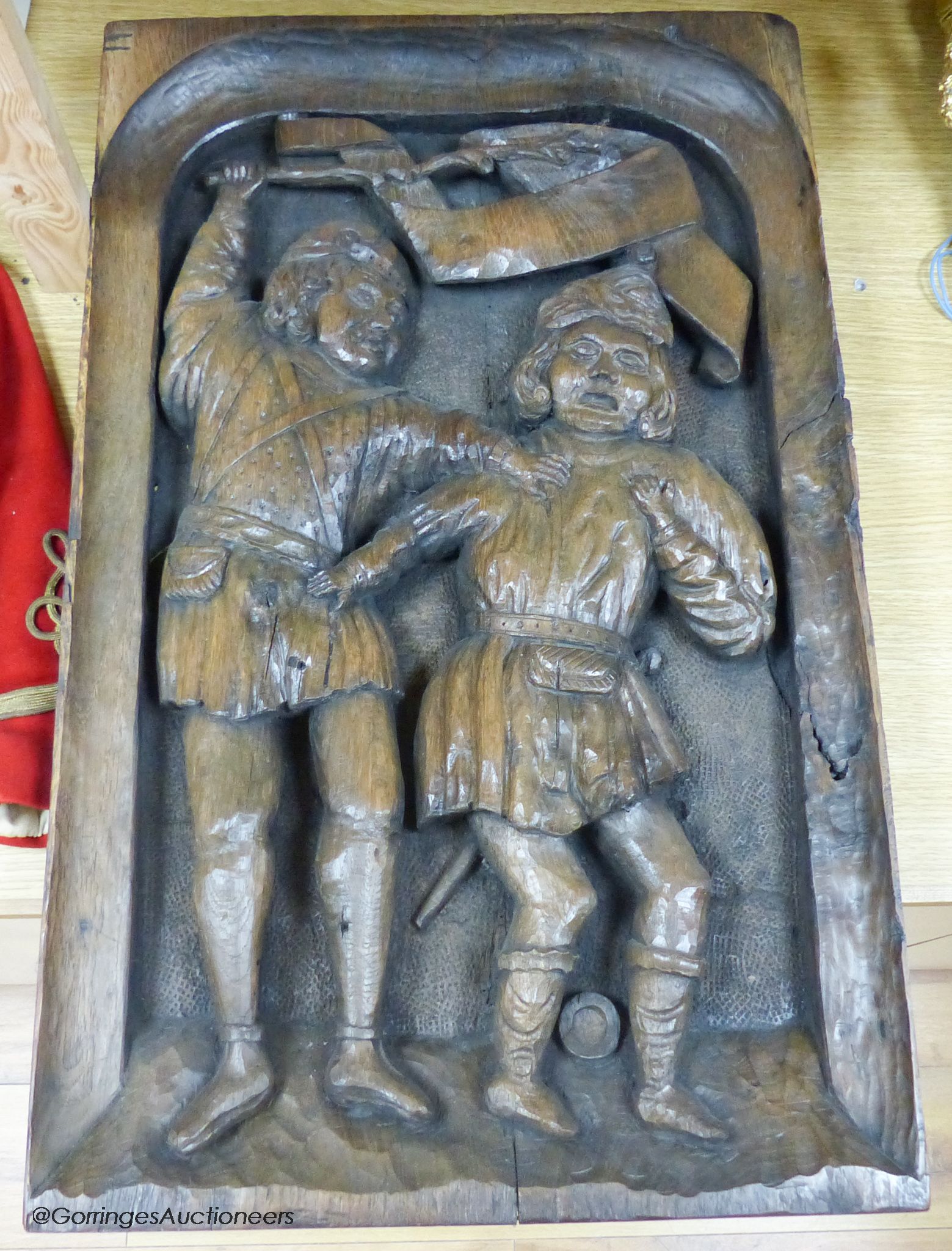 A 16th / 17th century carved oak panel
